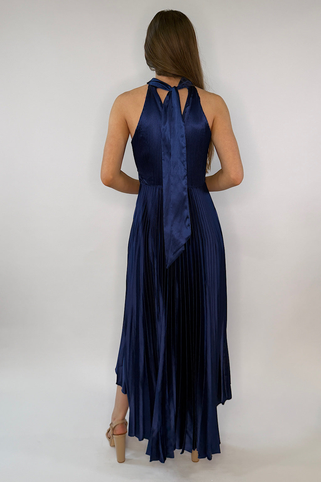 Zoey Navy Satin Halter Pleated High-Low Dress | Shop now! Fierce Angels Fashion Zoey Navy Satin Halter Pleated High-Low Dress | Shop now! Fierce Angels Fashion